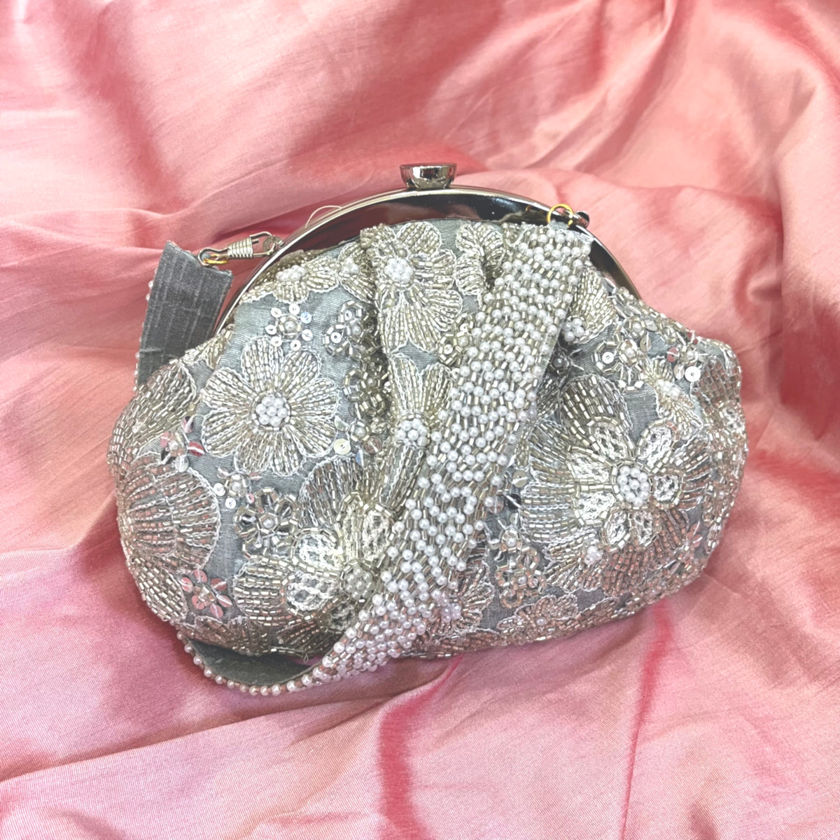 ELIXIR FLORAL SILVER SOFT CLUTCH WITH HANDLE