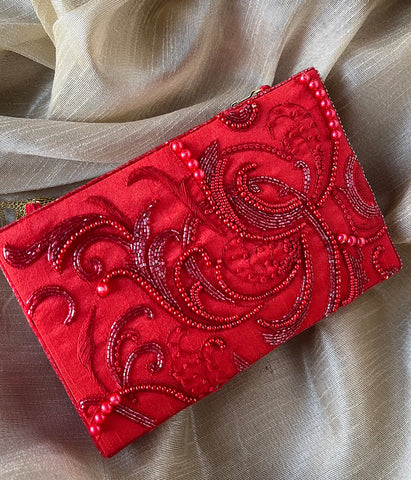 SCARLET ABSTRACT CLUTCH BAG